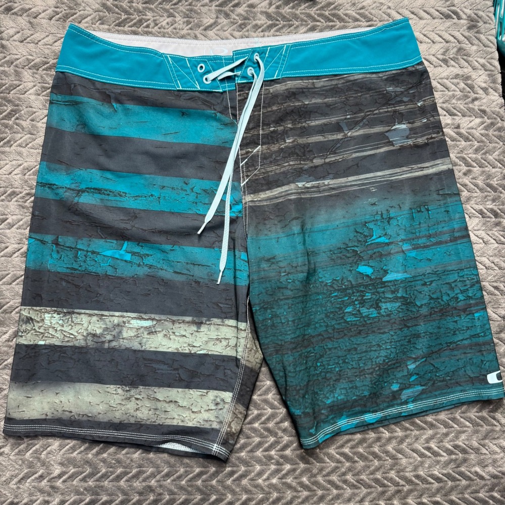 Oakley Board Shorts 40 Teal Black Striped Distressed Excellent‎ (1636)